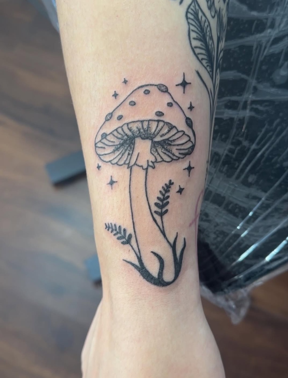 Fine line mushroom with stars tattoo