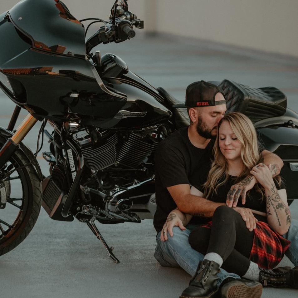 Couple with tattoos at Rebel Roots Tattoo studio