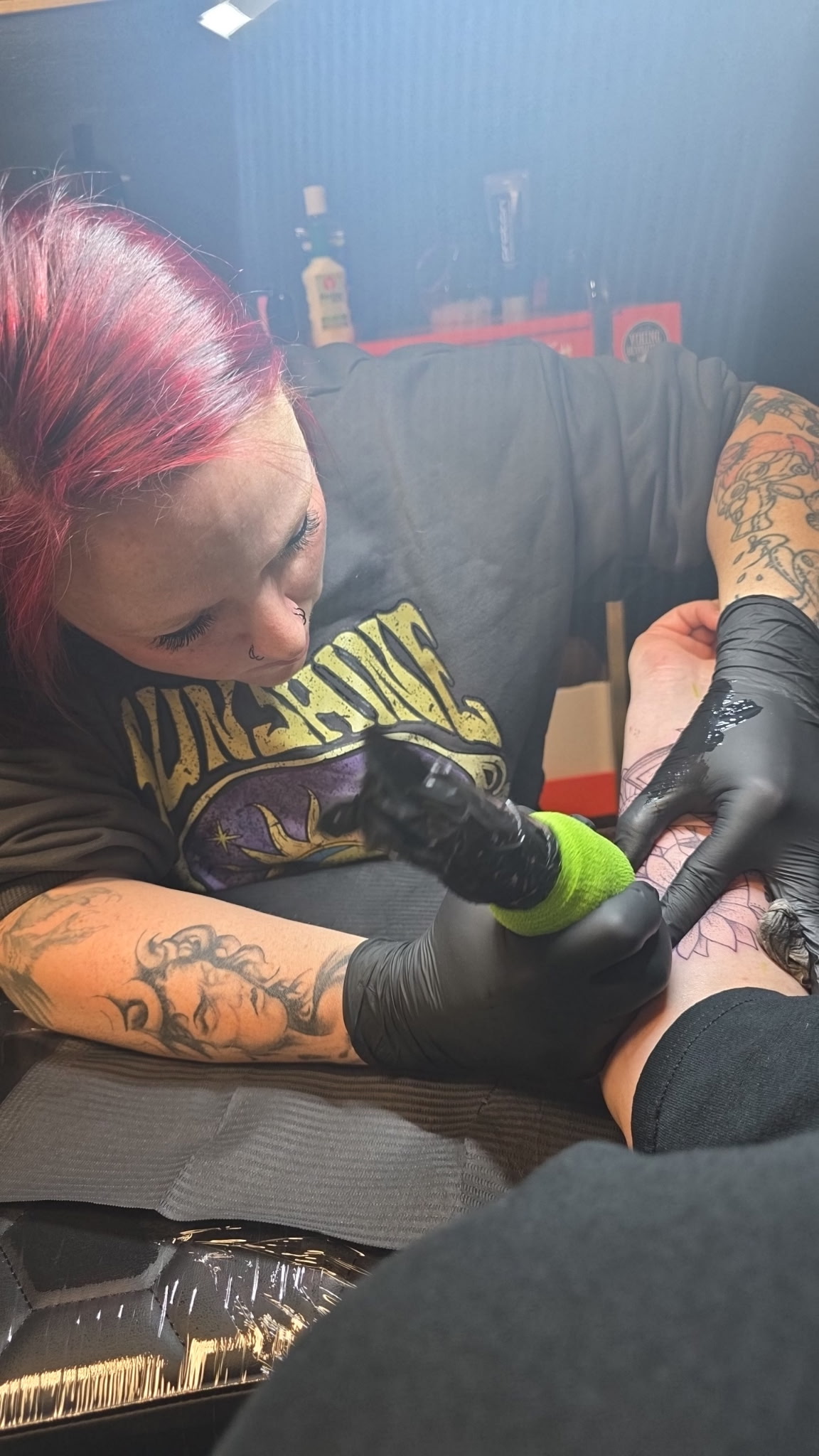 Hilary Siekman tattooing at Rebel Roots Tattoo