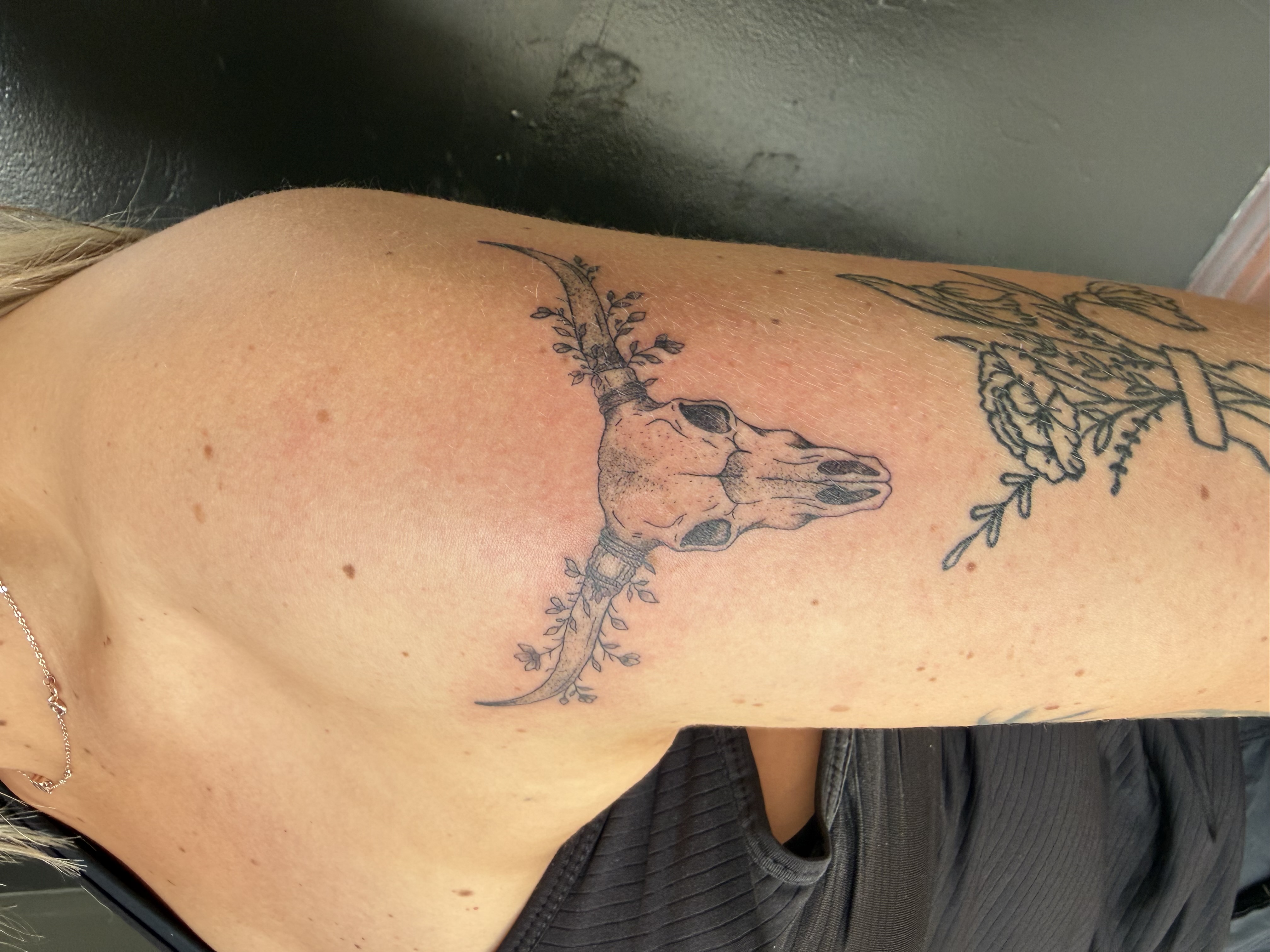 Skull flower leg abstract tattoo